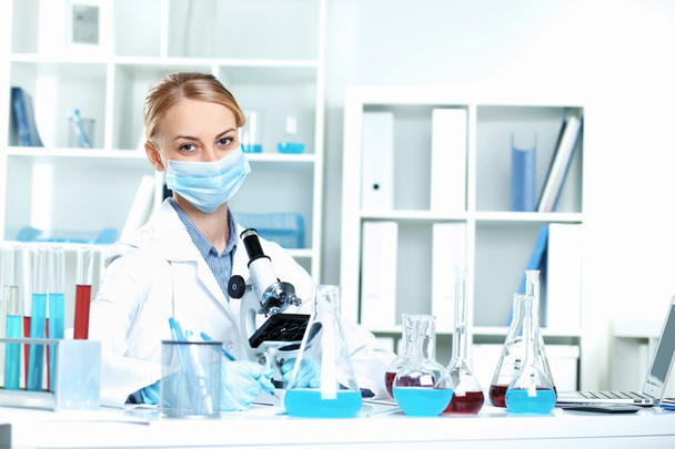 Young scientist working in laboratory - Photo, Image