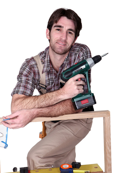 Man with hand drill - Zdjęcie, obraz