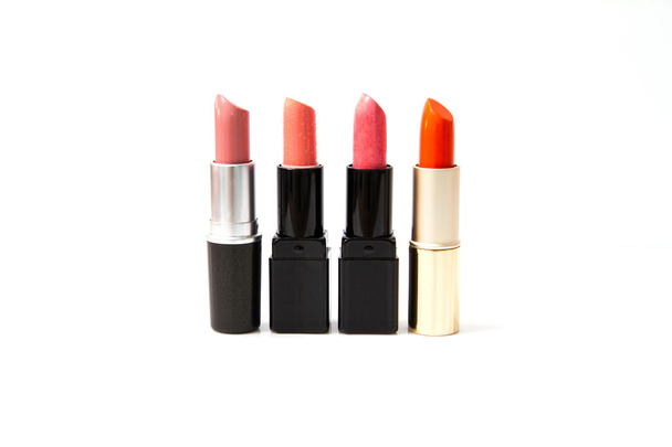 lipsticks op witte achtergrond - Foto, afbeelding
