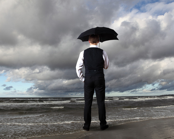 Businessman and weather - Photo, image