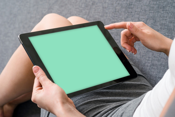 Woman takes a rest with tablet - Photo, image