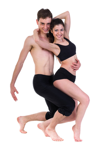 couple man and woman exercising fitness dancing on white background - Фото, зображення
