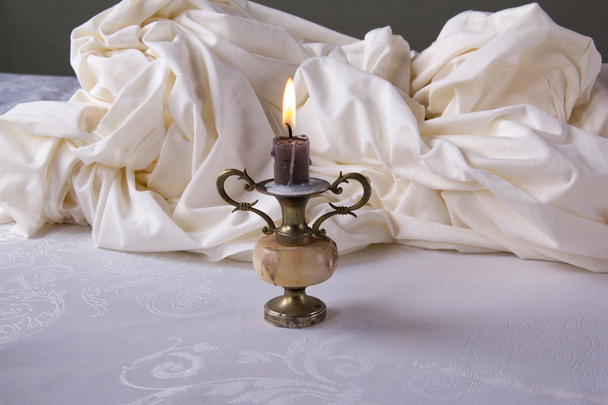 Good evening! White still life with candlestick - Photo, Image