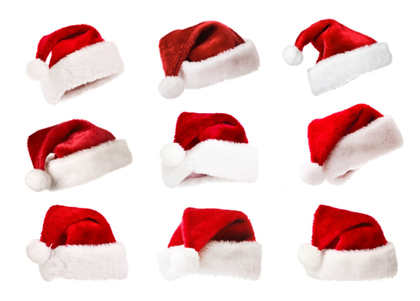 verzameling van santa hoeden geïsoleerd op wit - Foto, afbeelding
