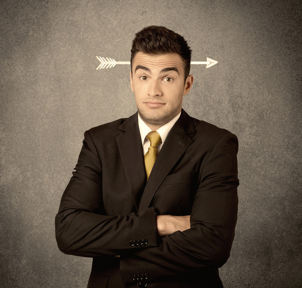 Young sales guy with arrow in the head - Photo, Image