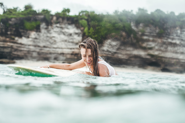 beautiful woman  in the ocean surf - Photo, Image