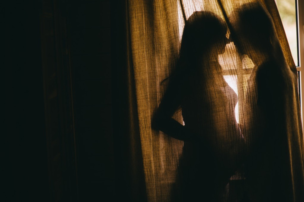 Silhouette of beautiful couple - Foto, Imagen