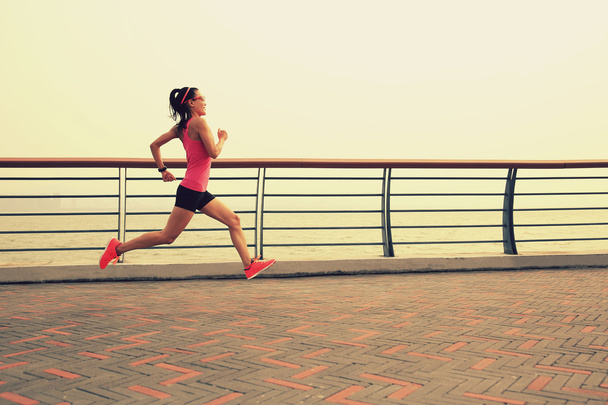 woman runner on seaside - Photo, Image