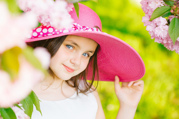 Girl in hat with bloom - Фото, зображення