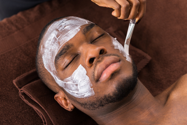 Therapist Applying Face Mask To Man - Photo, Image