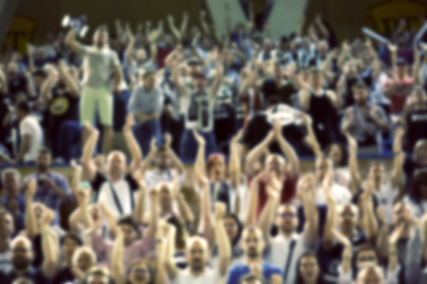 Blurred background of crowd of people in a basketball court - Photo, Image