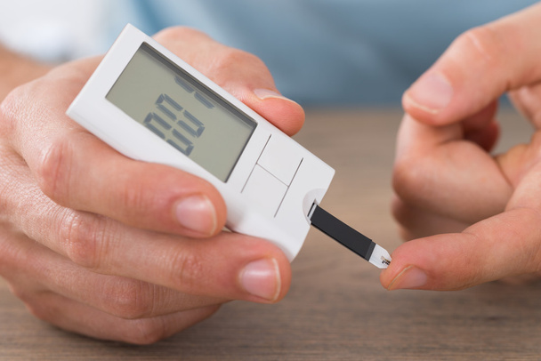 Patient Measuring Glucose Level  - Фото, изображение