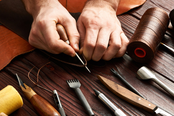Man working with leather  - Photo, Image
