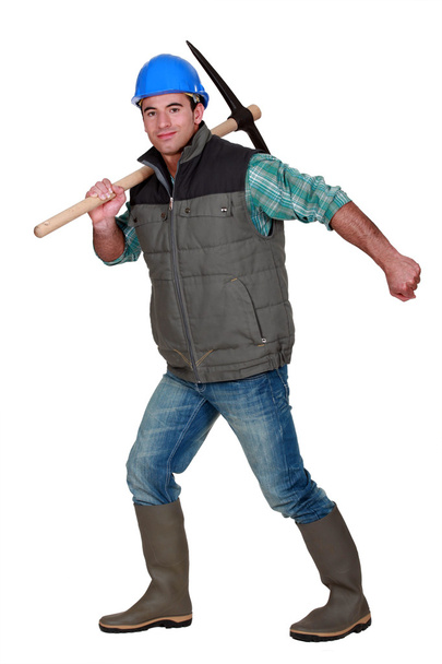 Worker with a pickaxe - Foto, afbeelding