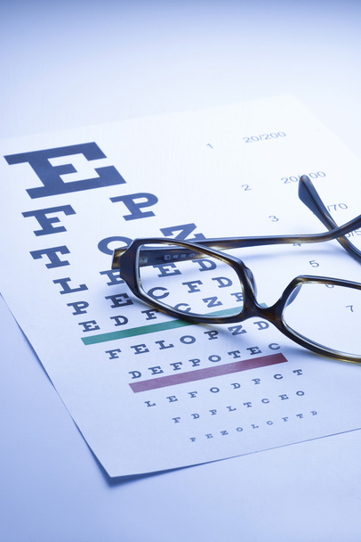 Spectacles with eye chart, blue tone - Photo, Image