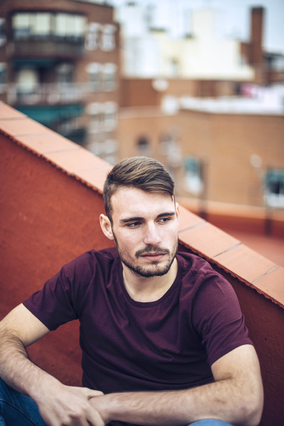 Handsome caucasian young man in casual clothes in urban environm - Fotografie, Obrázek