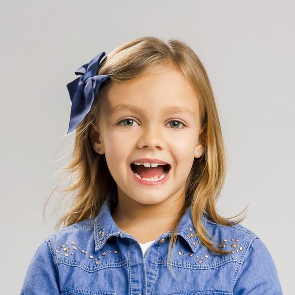 Little girl with a smiling expression - Photo, Image