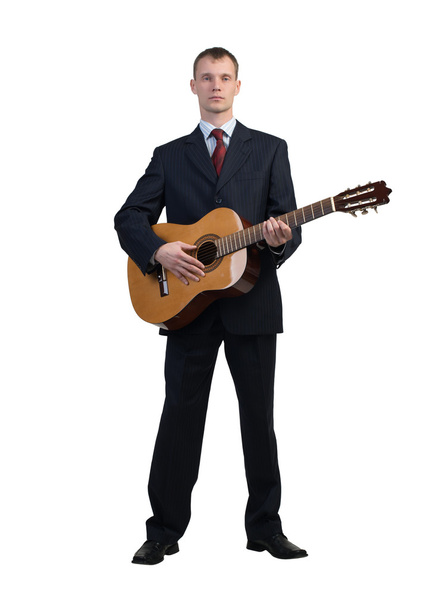 Businessman playing guitar - Фото, зображення