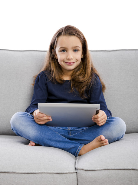 Little girl using a tablet - Photo, Image