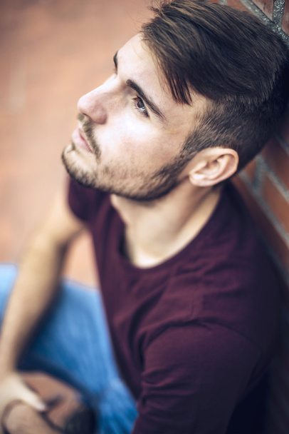 Handsome caucasian young man in casual clothes in urban environm - Fotografie, Obrázek