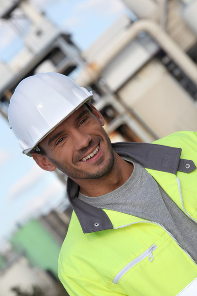 Construction worker in a reflective jacket - Fotó, kép