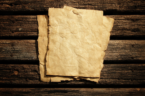 Old paper on wooden wall - Photo, Image