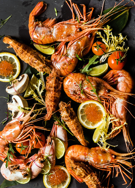 shrimps on stone plate - Foto, Imagen