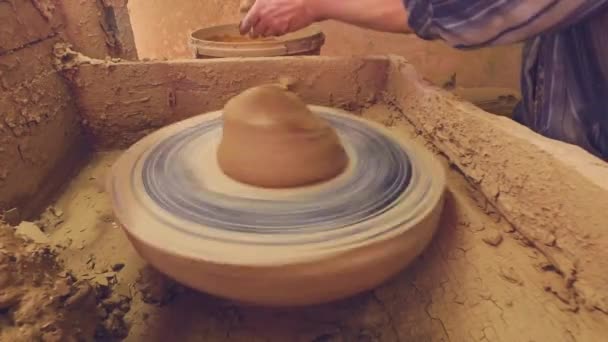 Creating a pot on a potter's wheel - Footage, Video
