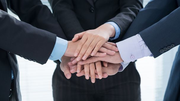 business people stacking hands - Photo, Image