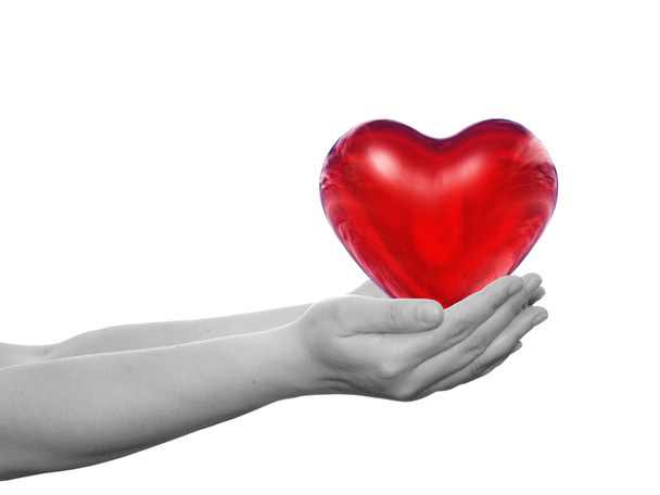  серце тримається в руках людини
  - Фото, зображення