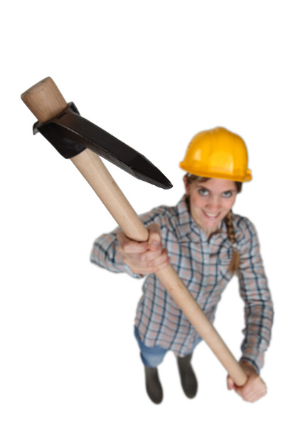 Woman with a pickaxe - Фото, изображение