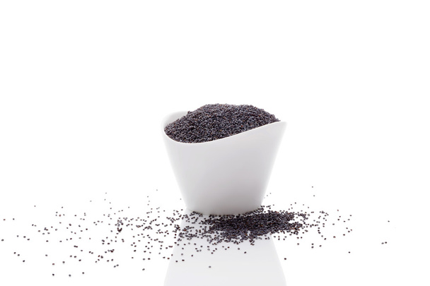 Black poppy seeds. - Фото, изображение