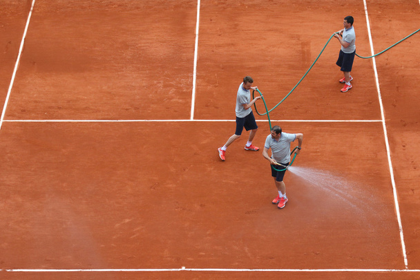 Court Philippe Chatrier preparation and maintenance team  at Le Stade Roland Garros during Roland Garros 2015 - Фото, зображення