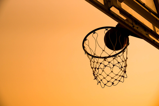 close up of basketball in a net - Photo, Image