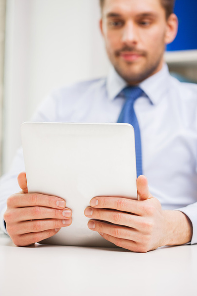 close up of businessman with tablet pc in office - Fotoğraf, Görsel