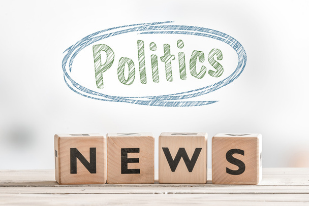 Politics news on a wooden table - Photo, Image