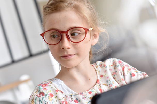 teenager with eyeglasses using tablet - Foto, Imagem