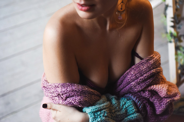 close-up portrait of a young sexy girl in knitted sweater - Foto, Imagem