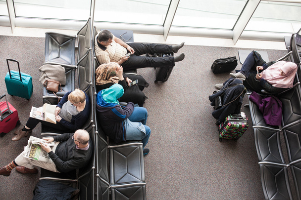Passengers in the airport waiting room  - Valokuva, kuva