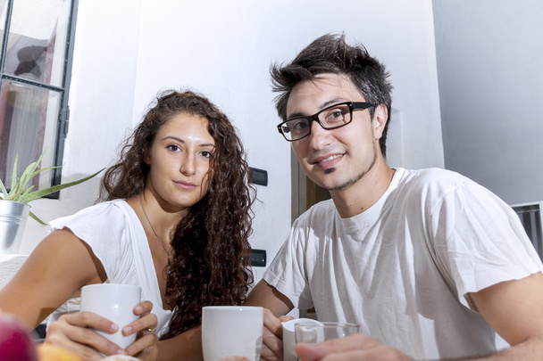 teenage couple has breakfast at home - Photo, Image