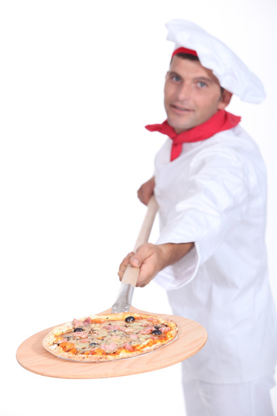 Pizza chef with a wooden peel - Foto, Imagem