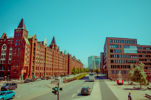 HAMBURG, GERMANY - JUNE 08, 2015: Historic buildings all street long in Hamburg, cars and buses passing trought - Zdjęcie, obraz