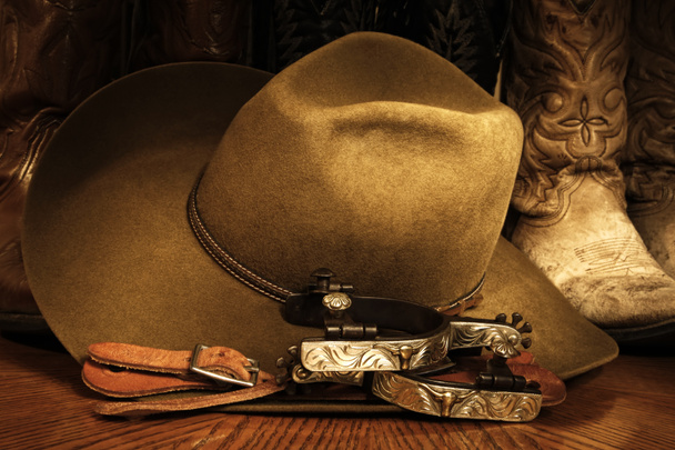 Ковбойські капелюхи, шпори і чоботи - Фото, зображення