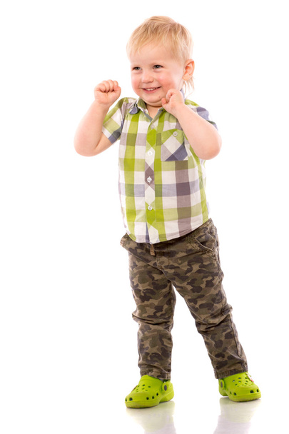 Naughty blonde little boy in shorts and shirt - Photo, Image