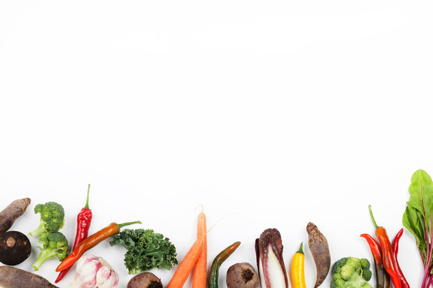 Vegetables on the bottom of  white background - Φωτογραφία, εικόνα