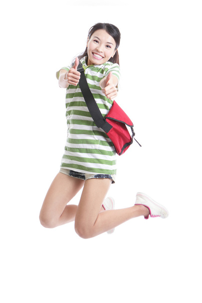 Student girl jumping and good hand gesture - Foto, Imagem