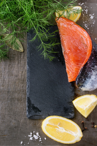 Salted salmon with dill - Фото, изображение