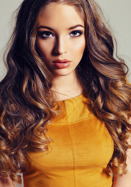 beautiful girl with dark curly hair  - Valokuva, kuva