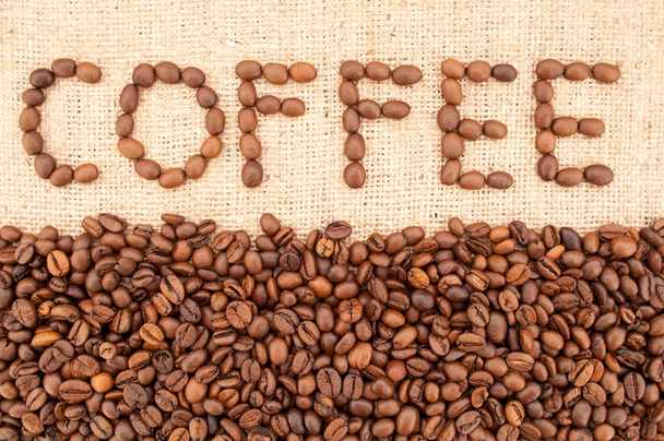 Word coffee made from coffee beans. Coffee background - Fotó, kép