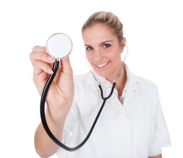 Cheerful doctor with stethoscope - Foto, afbeelding
